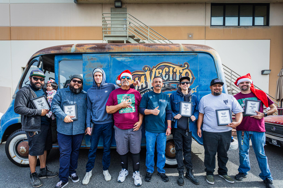 Tony and other volunteers of the Suavecito Toy Drive